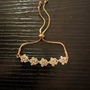 Gold Floral Bracelet with Crystal Accents